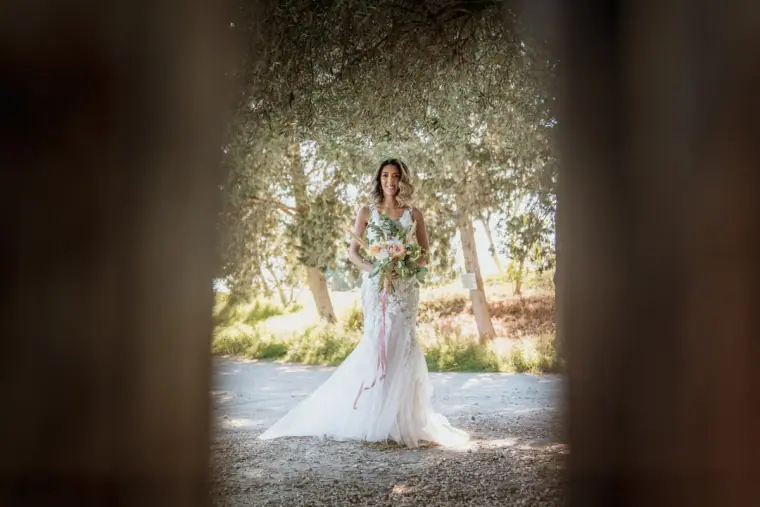 Emily & Chris's Cyprus Micro Wedding at Minthis Hills — Beziique — image 17 of 44